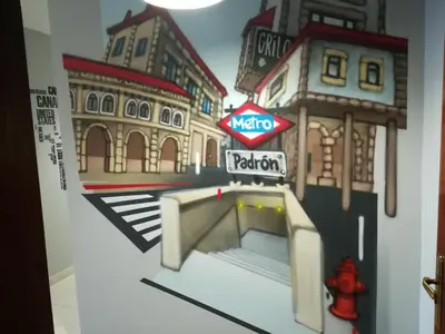 a wall with a mural of a city and a metro sign at Pension Grilo in Padrón