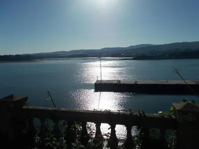 a view of a large body of water with a dock at Mirador Ría de Ribadeo in Ribadeo