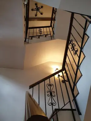two stairs in a house with a light on them at Hotel Mirador de Barcia in Ribeira de Piquin