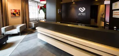 a lobby with a reception desk and a waiting room at Hotel Aroi Ponferrada in Ponferrada