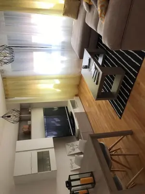 an overhead view of a living room with a couch at Alojamiento La Rosaleda in Ponferrada