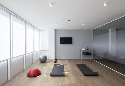 a room with some pilates equipment on the floor at Apartamentos Forum Ceao in Lugo