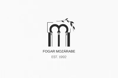 a logo for a mosque with two mausoleums at Fogar Mozárabe in Peñalba de Santiago