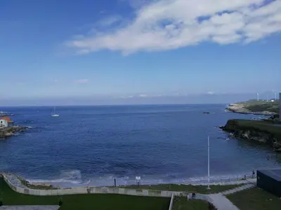 a view of a large body of water at San Ciprian Atico Playa by I Love Norte in San Ciprián