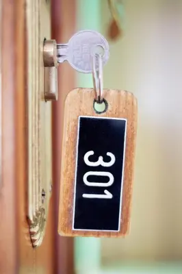 a door latch with a sign on it at Hotel Victorino in Silleda