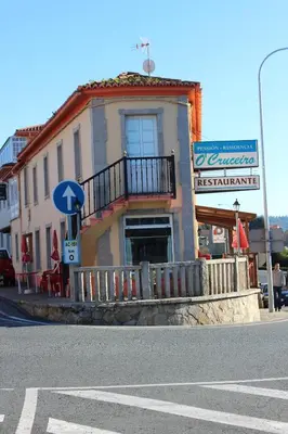 a building on the side of a street at O Cruceiro in Puentedeume