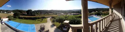 an overhead view of a swimming pool in a resort at A Quinta de Lapido in Ortoño