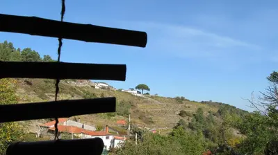 a view from the top of a hill with houses at Casa do Solpor in La Teijeira