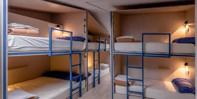 two sets of bunk beds in a room at Santiago KM-0 in Santiago de Compostela