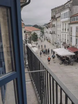 a view of a city street from a balcony at Santiago KM-0 in Santiago de Compostela
