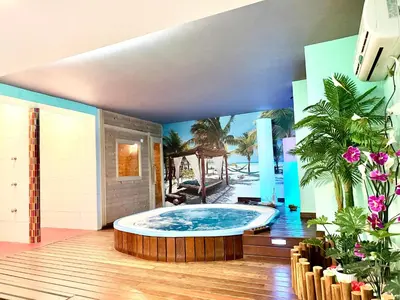 a large jacuzzi tub in the middle of a room at Hotel Spa Galatea in Burela de Cabo