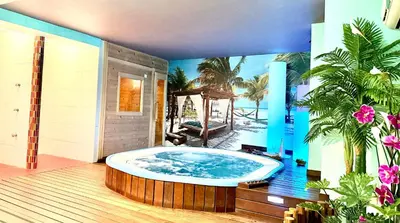 a jacuzzi tub in the middle of a room at Hotel Spa Galatea in Burela de Cabo