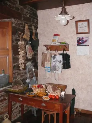 a room with a table with food on it at Casa do Catalán - Casa completa - Navia de Suarna in Navia de Suarna
