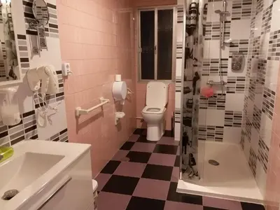 a bathroom with a toilet and a sink and a shower at Pensión Mar Azul in Santiago de Compostela