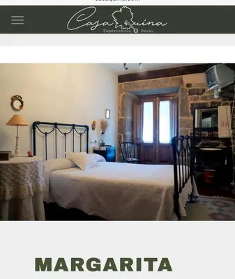 a bedroom with a large bed and a window at Casaquina in La Mezquita