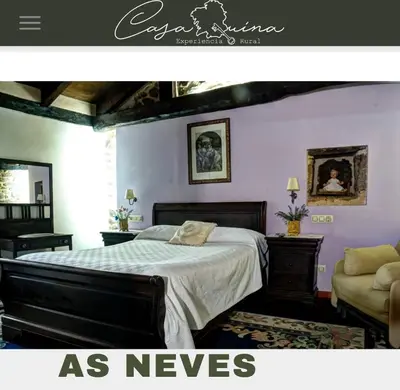 a bedroom with a large bed with purple walls at Casaquina in La Mezquita