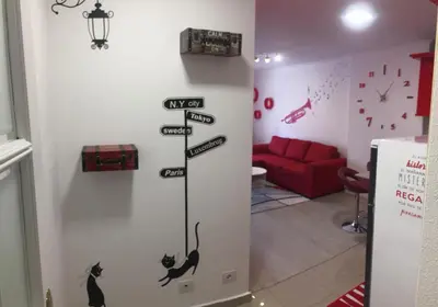 a room with a cat sign on the wall at Apartamento Centro Frente Muralla in Lugo
