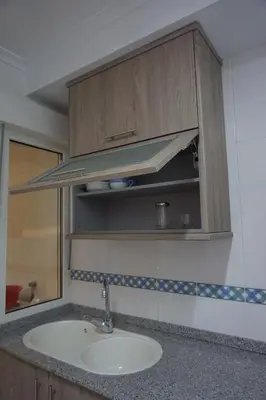 a sink in a kitchen with a counter top at Duplex Ribadeo in Ribadeo