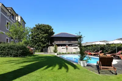 a yard with a swimming pool and a house at Casa de Castro in Cartavio