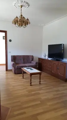 a living room with a couch and a coffee table at Casa Páez in Pasantes