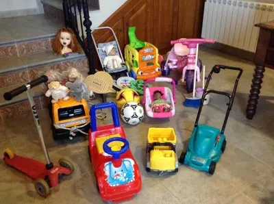 a bunch of toys are sitting on the floor at Apartamentos La Cruz de Paderne in Navia