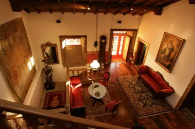 an overhead view of a living room with a table and chairs at Casa Grande de Rosende in Sober