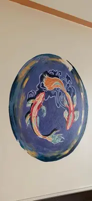 a blue plate with a dragon painted on it at Hotel Brial in Perillo