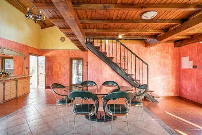 a dining room with a table and chairs at Luxury Valdeorras in Valdegodos