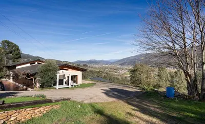 a house with a view of the mountains at Luxury Valdeorras in Valdegodos