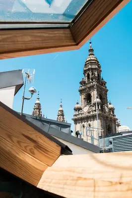a view of a building with a clock tower at Casa da Balconada in Santiago de Compostela