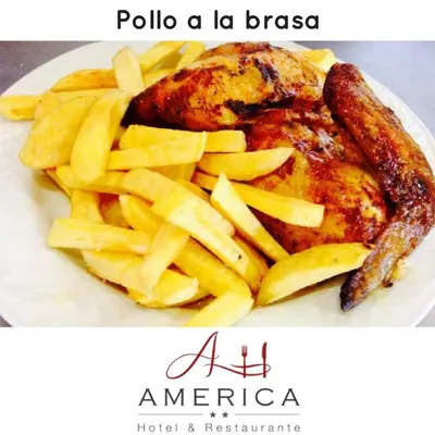 a plate of food with a chicken and french fries at Hotel Restaurante America in Oca