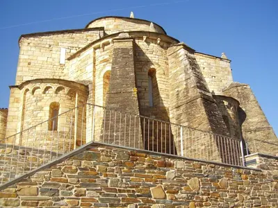 a stone building with a fence on top of it at Finca Goleta in Foz