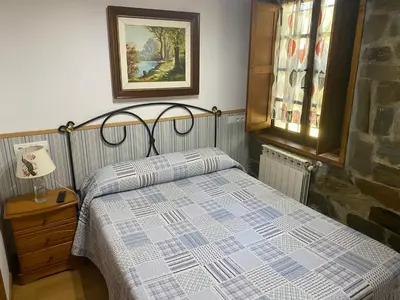 a bathroom with a sink and a shower and a toilet at Hotel Rural Camino Medulas in Ponferrada
