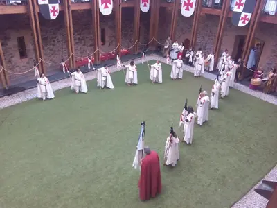 a group of people in white uniforms on a green field at Apartamento Casco Antiguo Ponferrada in Ponferrada