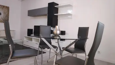 a dining room with a table and chairs at Ourense Termal in Ourense