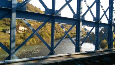 a view of a bridge over a river at Casa Alpargateiro in Os Peares