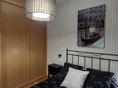 a bedroom with a bed and a pendant light at Cozy apartment in Orense of 45 m² with parking in Ourense
