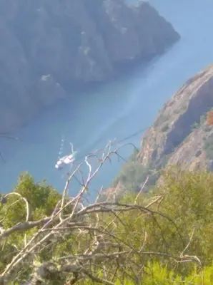 a plane flying over a mountain in the sky at Cozy apartment in Orense of 45 m² with parking in Ourense