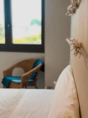 a spider on the edge of a bed in a room at Villa Galicia in Caldas de Reis