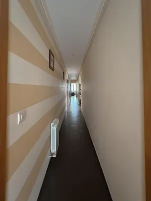 a corridor in a building with a hallway at Casa Idalia in Ourense