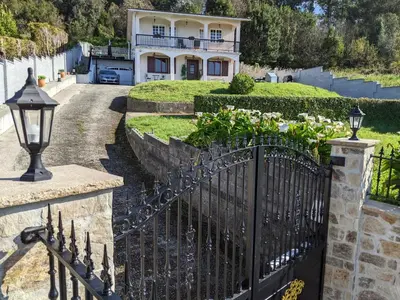 a gate in front of a house at Casa Cabanas in Cabañas