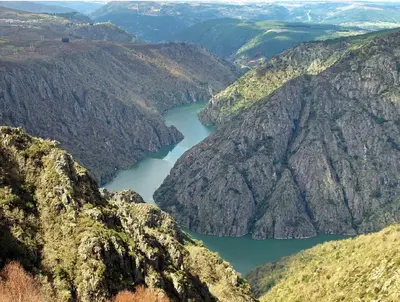 a view of a river between two mountains at Casa Cabanas in Cabañas