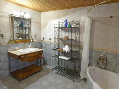 a bathroom with a sink and a tub and a shower at Casa Samuel in Navia