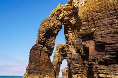 a rock sculpture of an elephant on the beach at Alojamientos Barreiros 3000 in Barreiros