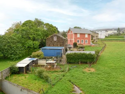 an aerial view of a house and a yard at Alojamientos Barreiros 3000 in Barreiros