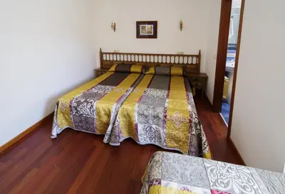 a bedroom with a bed in a room at As Areas I in Viveiro