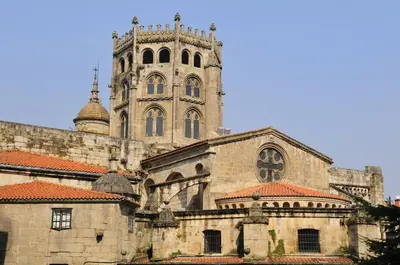 an old building with a tower and a church at Piso centro in Ourense