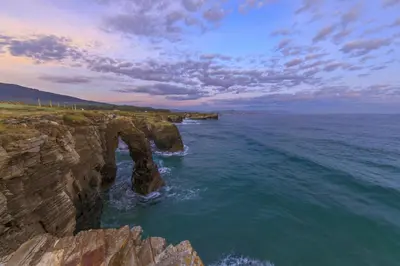 an aerial view of the ocean with a rocky coastline at Villas Las Catedrales in Ribadeo