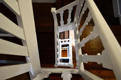 a view of the stairs in a house at Albergue O Fogar de Teodomiro in Santiago de Compostela