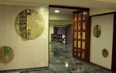 a hallway with a door and a room with a hallway at Hotel Windsor in Santiago de Compostela